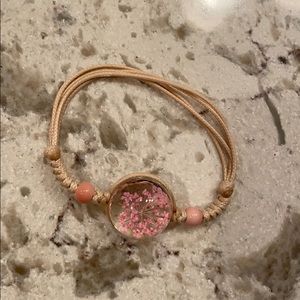 NWOT pink string bracelet